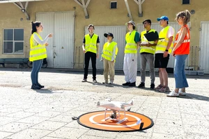 Students and researchers during a test drone flight. 